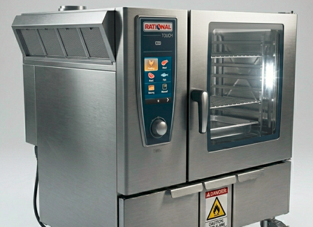 Certified engineer servicing a combi oven